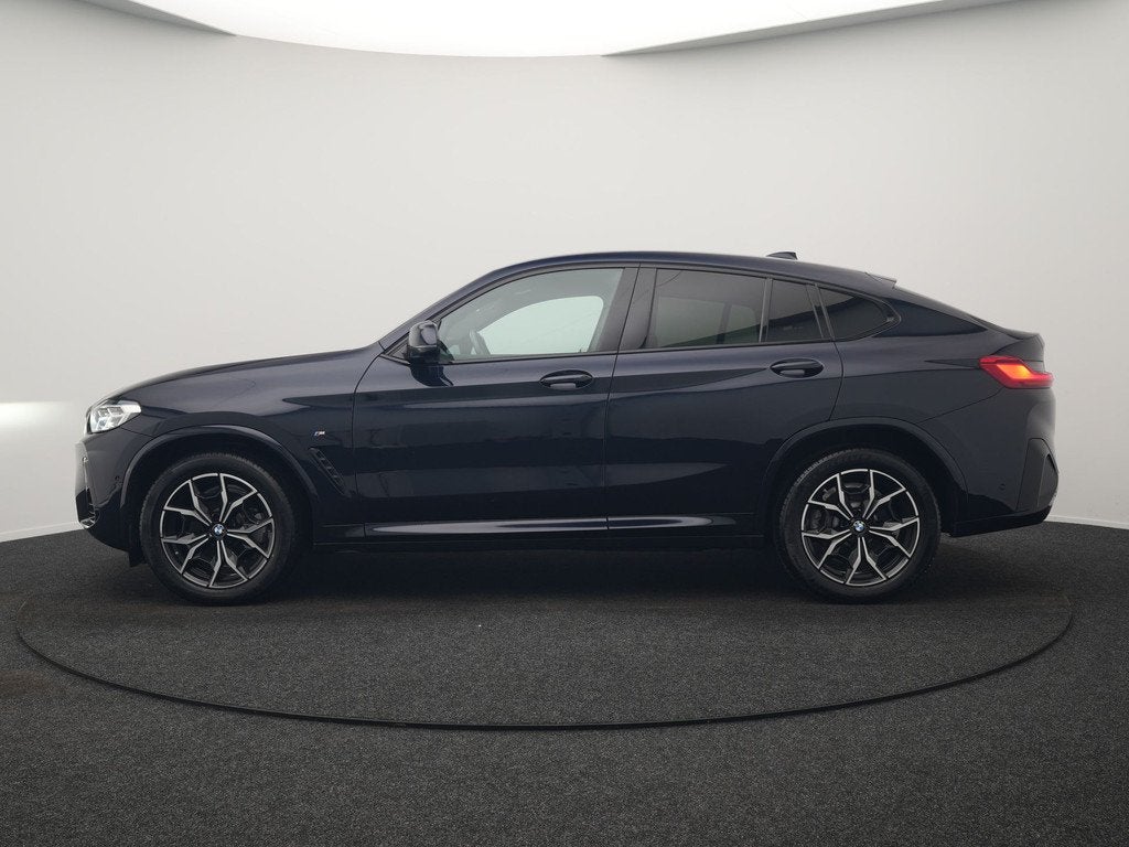 BMW X4 xDrive20i M Sport 184pk Dealer O.H. Carbon Schwarz Me, 1998 cc, Gebruikt, Zwart, 4 cilinders