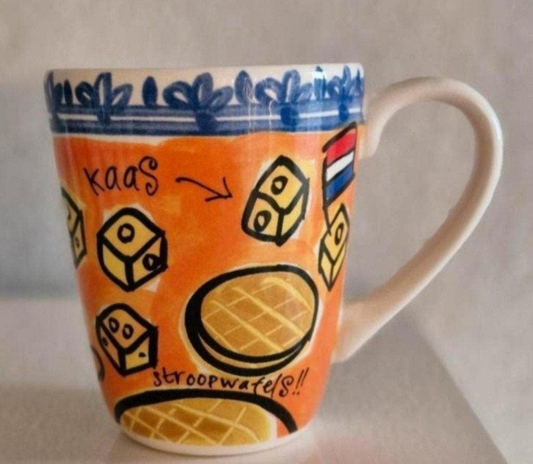 Beker Blond Amsterdam Learning Dutch while you're drinking, Ophalen of Verzenden, Zo goed als nieuw, Aardewerk, Kop(pen) en/of Schotel(s)
