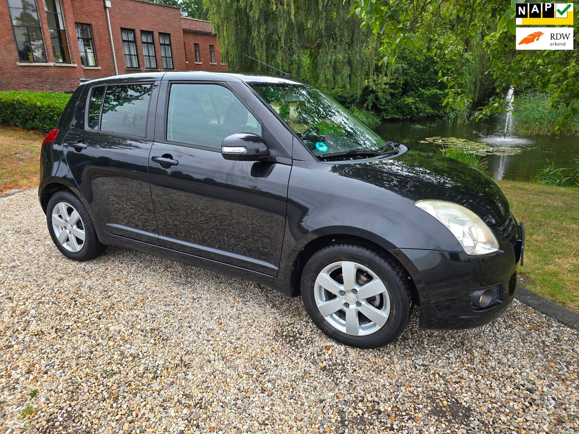 Suzuki Swift 1.3 Limited 5-deurs Airco trekhaak, Auto's, Voorwielaandrijving, 400 kg, Alcantara, Origineel Nederlands