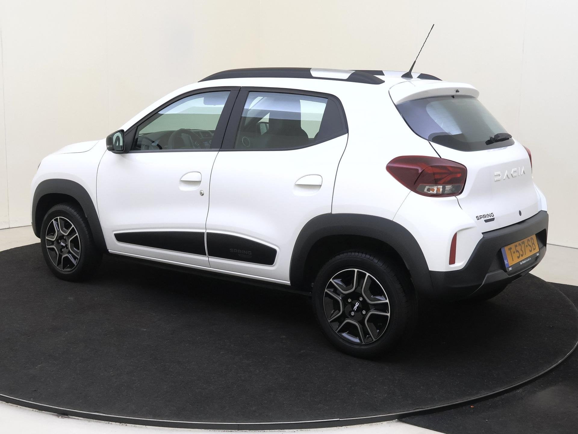 Dacia Spring Essential 27 kWh 23dkm / Airco, Auto's, Gebruikt, Leder en Stof, Wit, Elektrische ramen