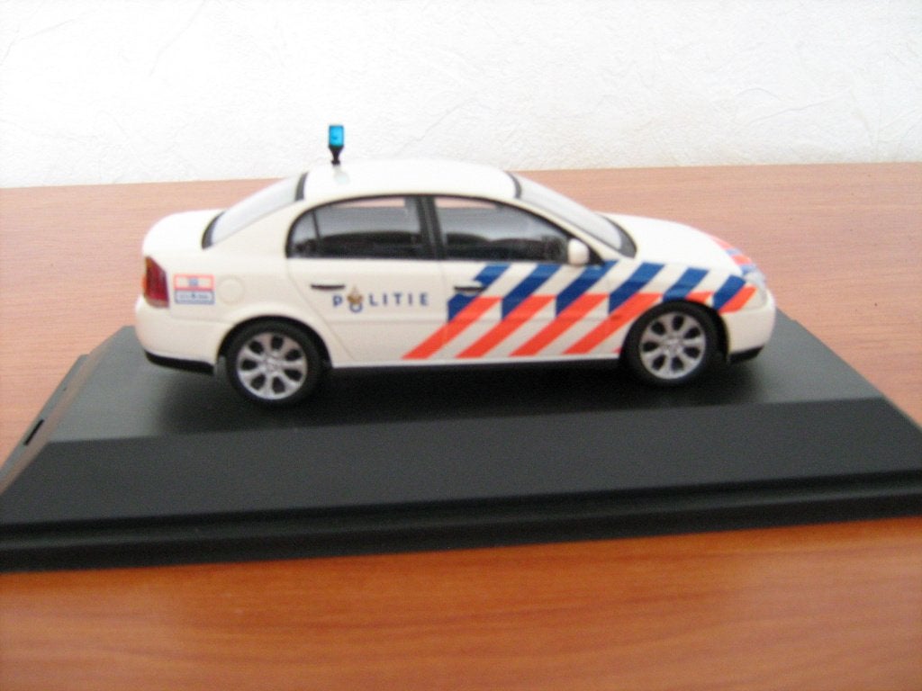 Opel Vectra Politie Nederland, Schuco, in doos.  Schaal 1:43, Ophalen of Verzenden, Nieuw, Auto, Overige merken