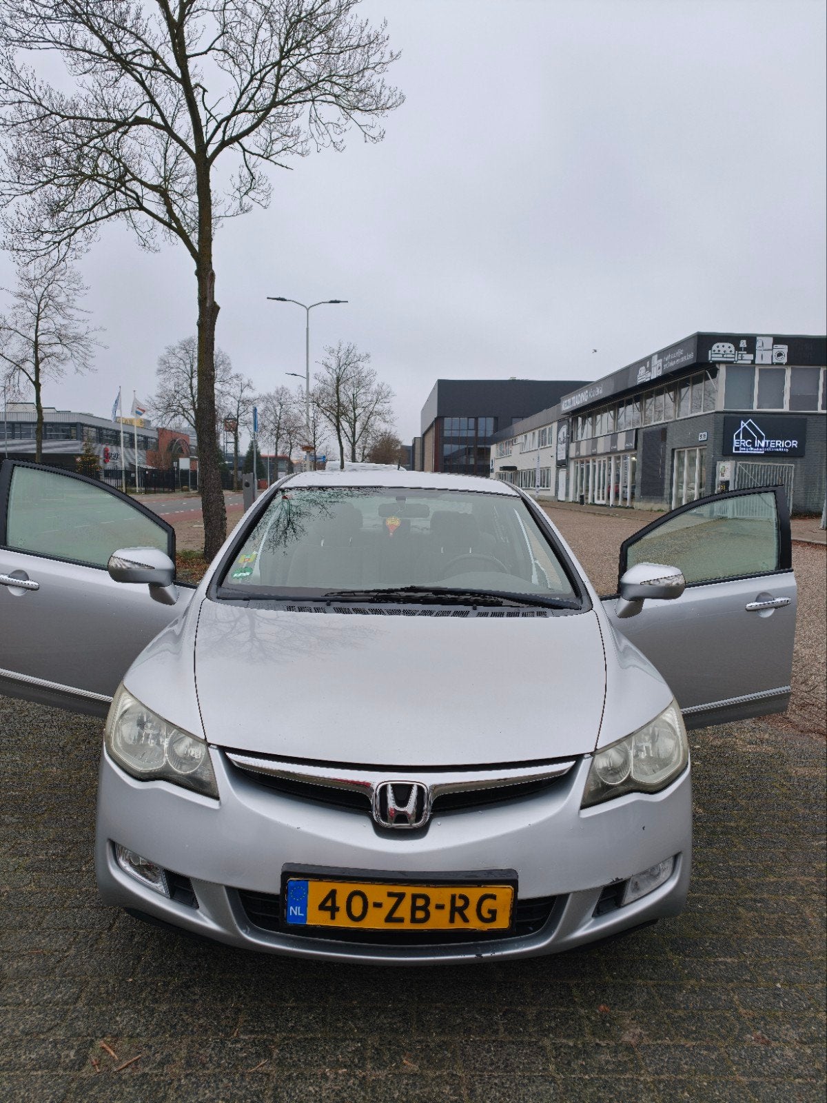 Honda Civic 1.3 Vtec Hybrid 4DR C-tr. Grijs, Auto's, Honda, Origineel Nederlands, 22 km/l, Sedan, 1339 cc