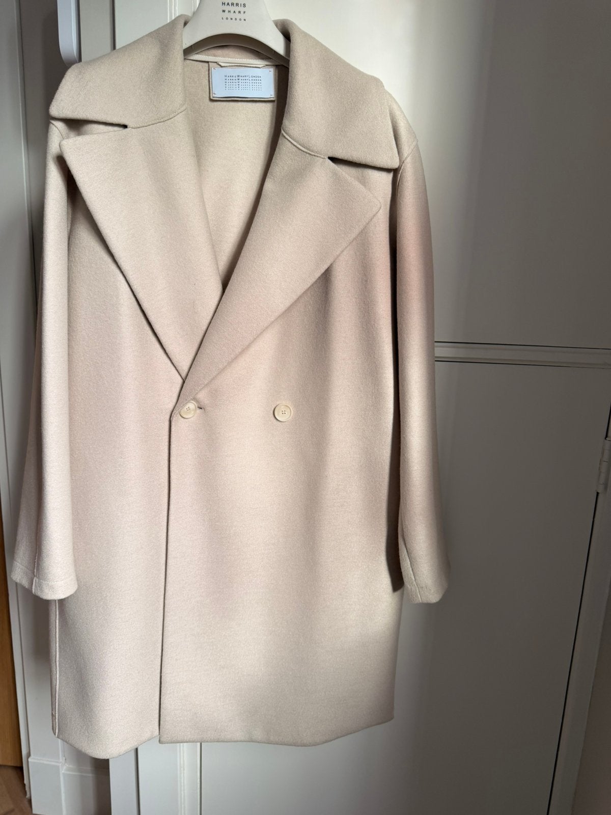 Hele mooie wollen jas in de kleur creme, Ophalen of Verzenden, Zo goed als nieuw, Maat 42/44 (L), Beige