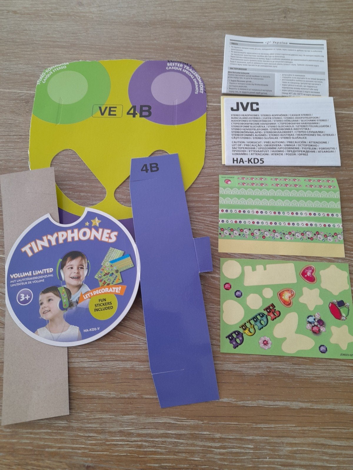Bijna gratis  JVC kinderkoptelefoon paars/groen Schooltip