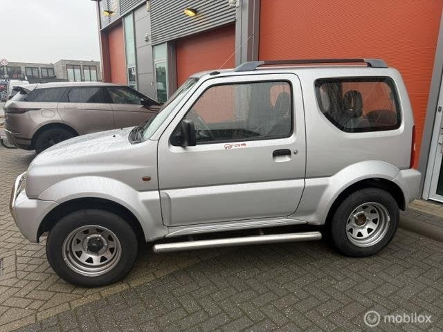 Suzuki Jimny 1.3 JLX 4x4 103.006 KM NAP-APK 2027, Auto's, 13 km/l, Stof, 4 stoelen, Origineel Nederlands