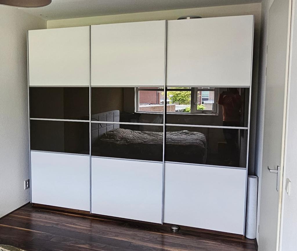 Linnenkast / kledingkast met schuifdeuren en ladeblokken, Overige materialen, Gebruikt, 200 cm of meer, 200 cm of meer