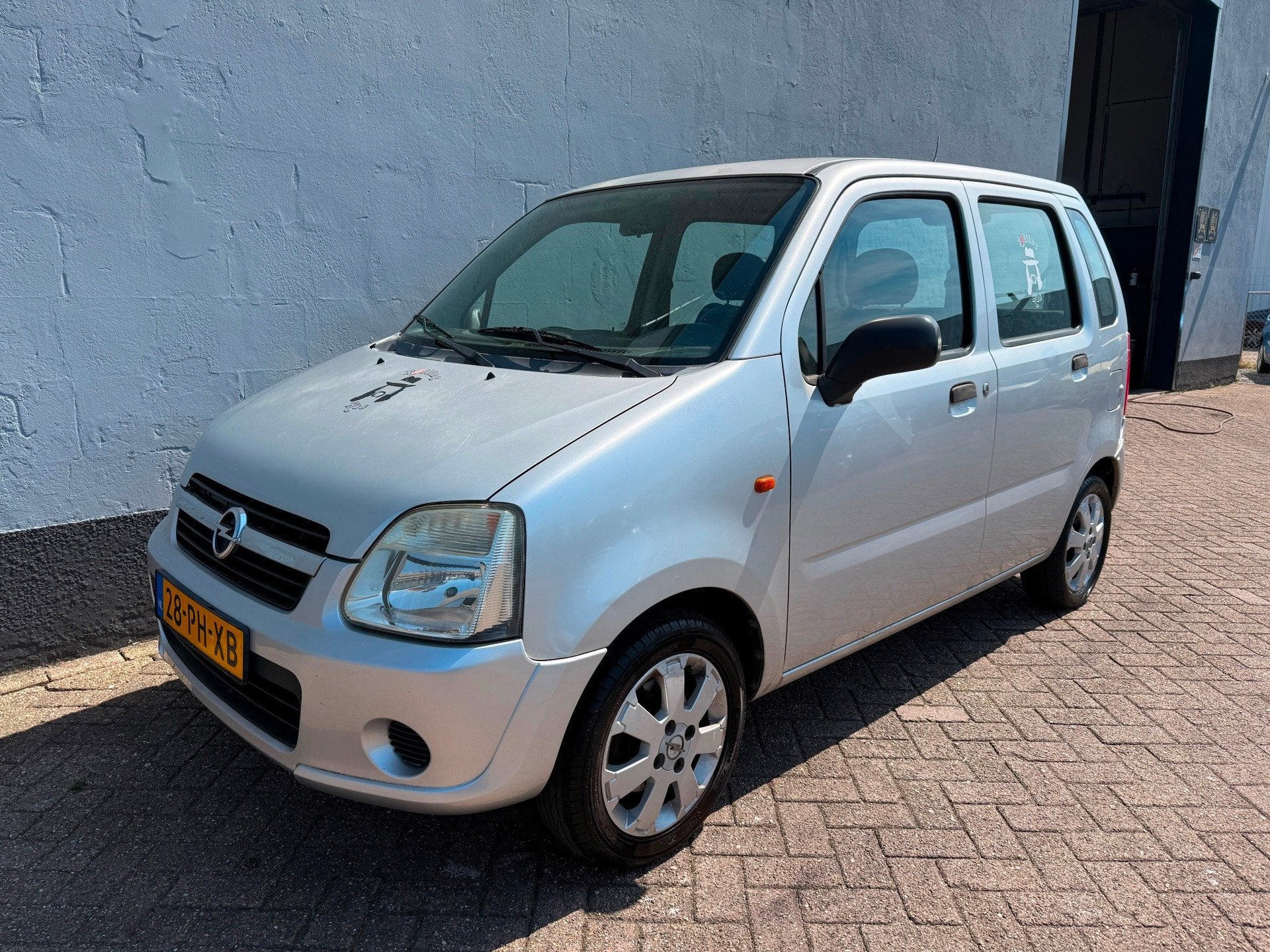Opel Agila 1.0-12V Essentia, Auto's, Opel, Voorwielaandrijving, Gebruikt, 31 €/maand, 60 pk