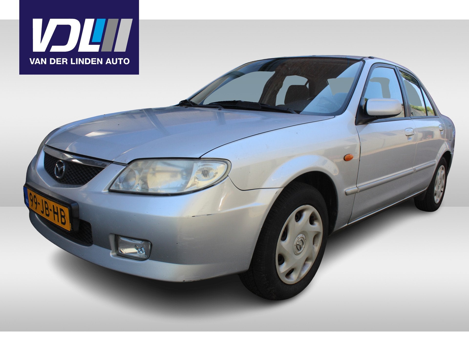 Mazda 323 1.6i Touring Nieuwe apk l Airco l Trekhaak l Elekt, Elektrische ramen, Stof, Gebruikt, 4 cilinders