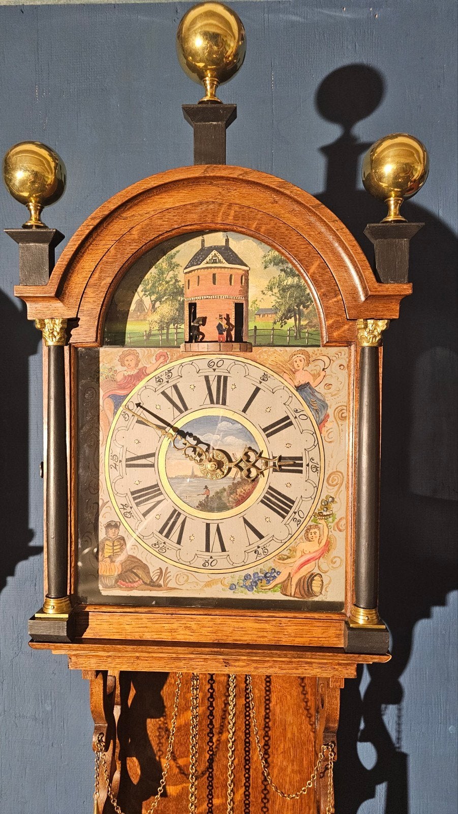 Antieke Friese Staartklok met carrousel, Ophalen