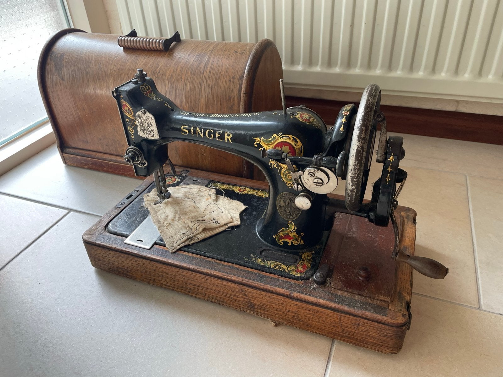 Antieke Singer Naaimachine, Ophalen