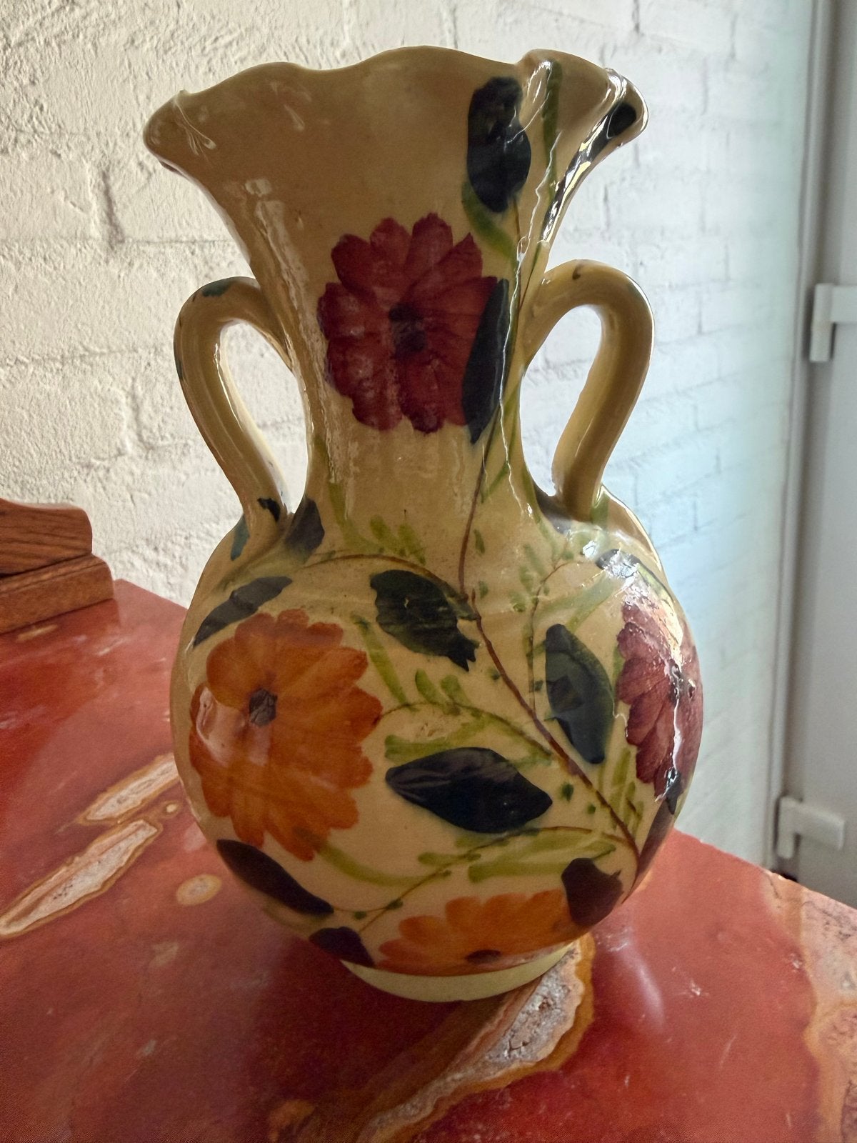Antieke vaas met bloemmotief, Ophalen