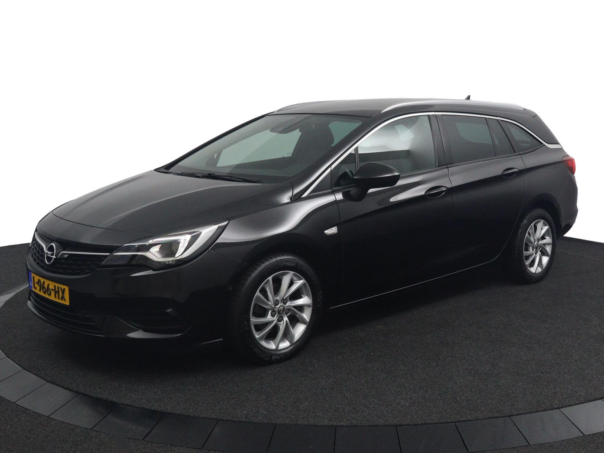 Opel Astra Sports Tourer 1.2*NAVI*ECC*CAM*CRUISE*HAAK*TEL*LE, Auto's, Voorwielaandrijving, Stof, Euro 6, 1199 cc