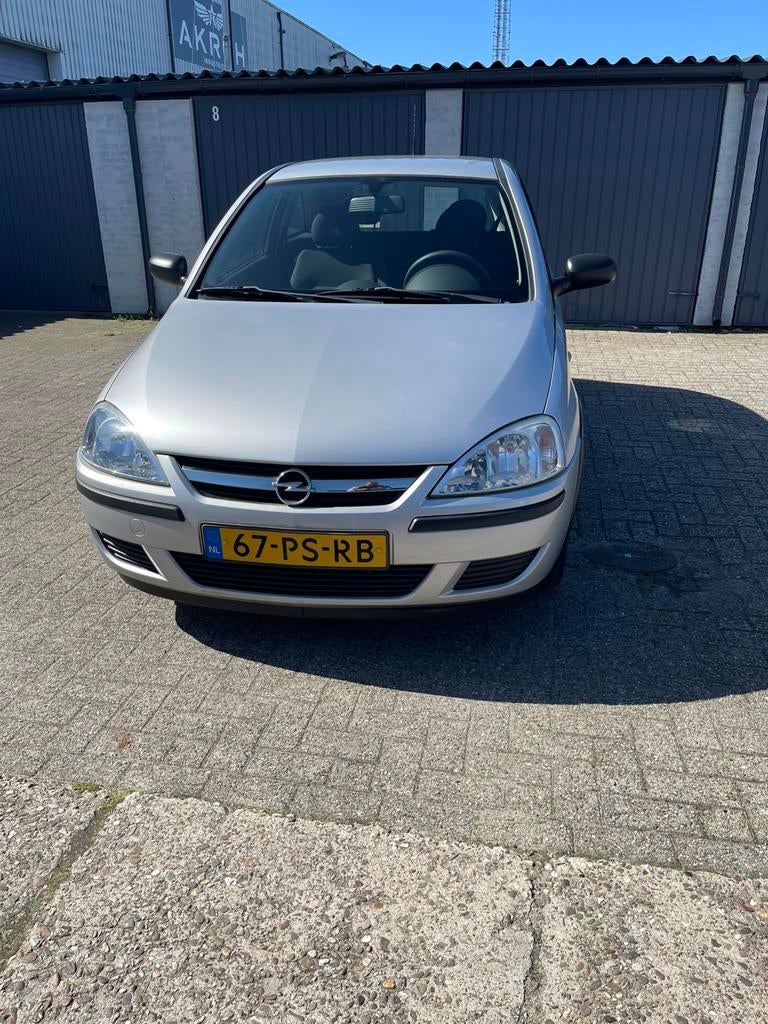 Opel Corsa 1.2 16V Twinport 3D 2004 Grijs apk nieuw, Auto's, Voorwielaandrijving, 450 kg, 31 €/maand, 4 cilinders
