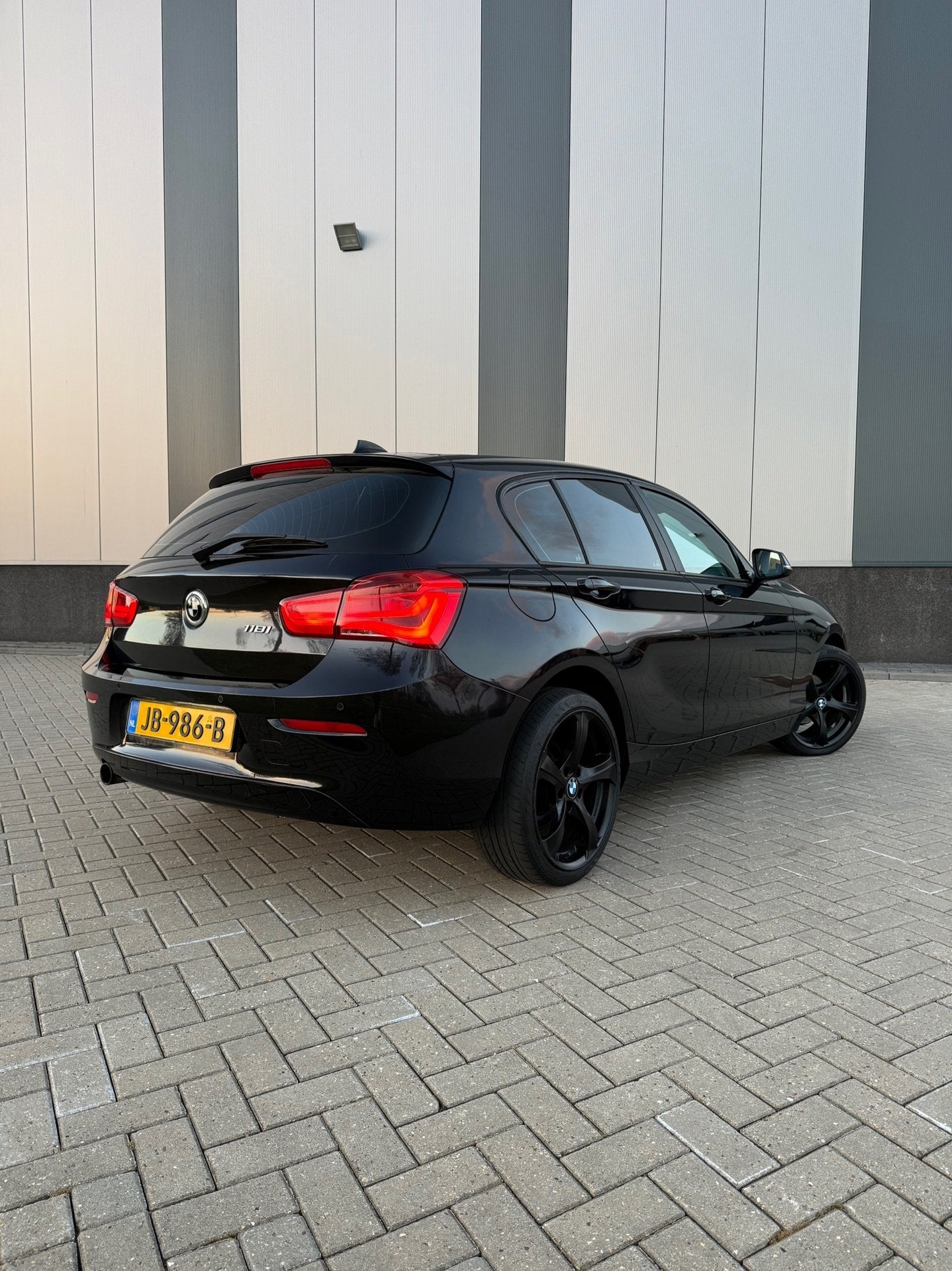 BMW 1-serie 118i Automaat 2016 | NAP | Lederen bekleding, Auto's, Dealer onderhouden, Gebruikt, Zwart, Bedrijf