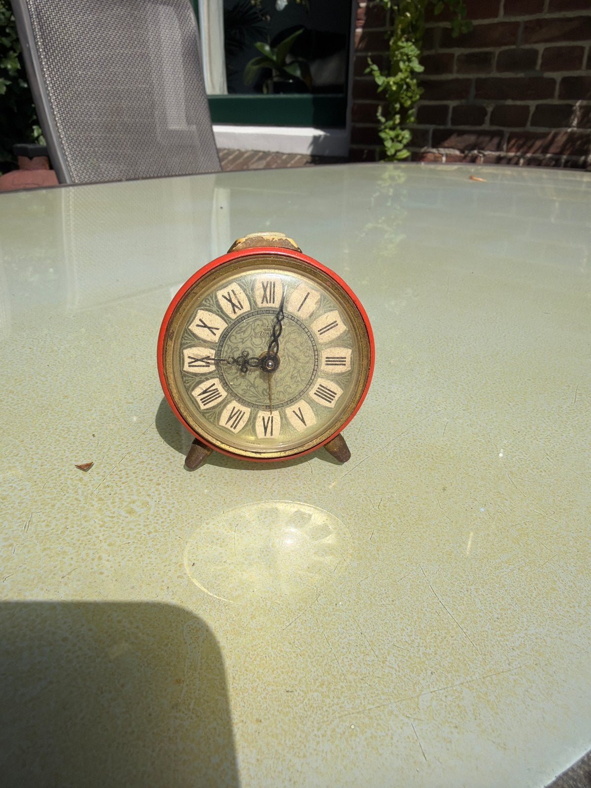 Vintage Lumen wekker, rood met Romeinse cijfers, Antiek en Kunst, Ophalen