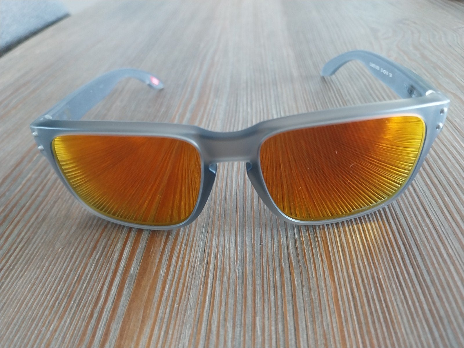 Oakley zonnebril met oranje spiegelglazen, Sieraden, Tassen en Uiterlijk, Zonnebrillen en Brillen | Heren, Ophalen, Zonnebril
