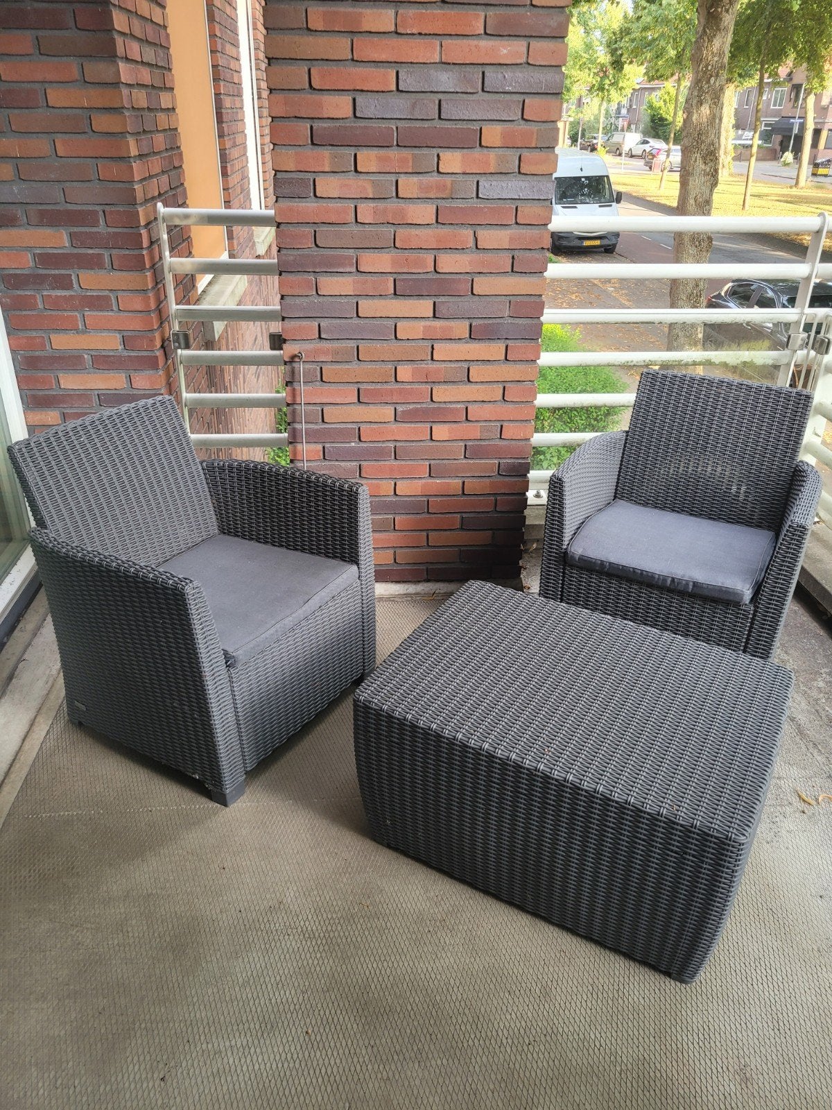 Wicker loungeset met opbergruimte en kussens, Tuin en Terras, Ophalen, 4 zitplaatsen, Gebruikt, Bank