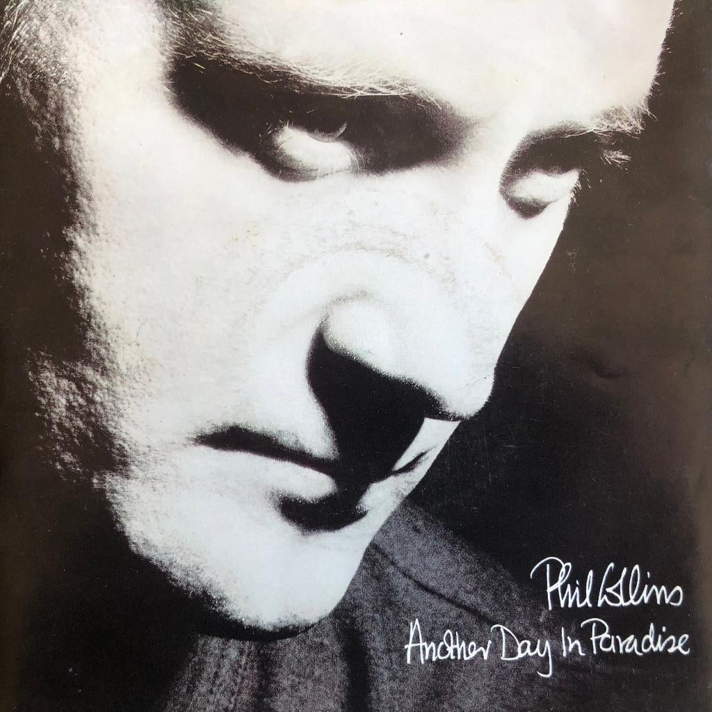 1989	Phil Collins		Another Day In Paradise, Fotohoes, 7 inch, Ophalen of Verzenden, Zo goed als nieuw