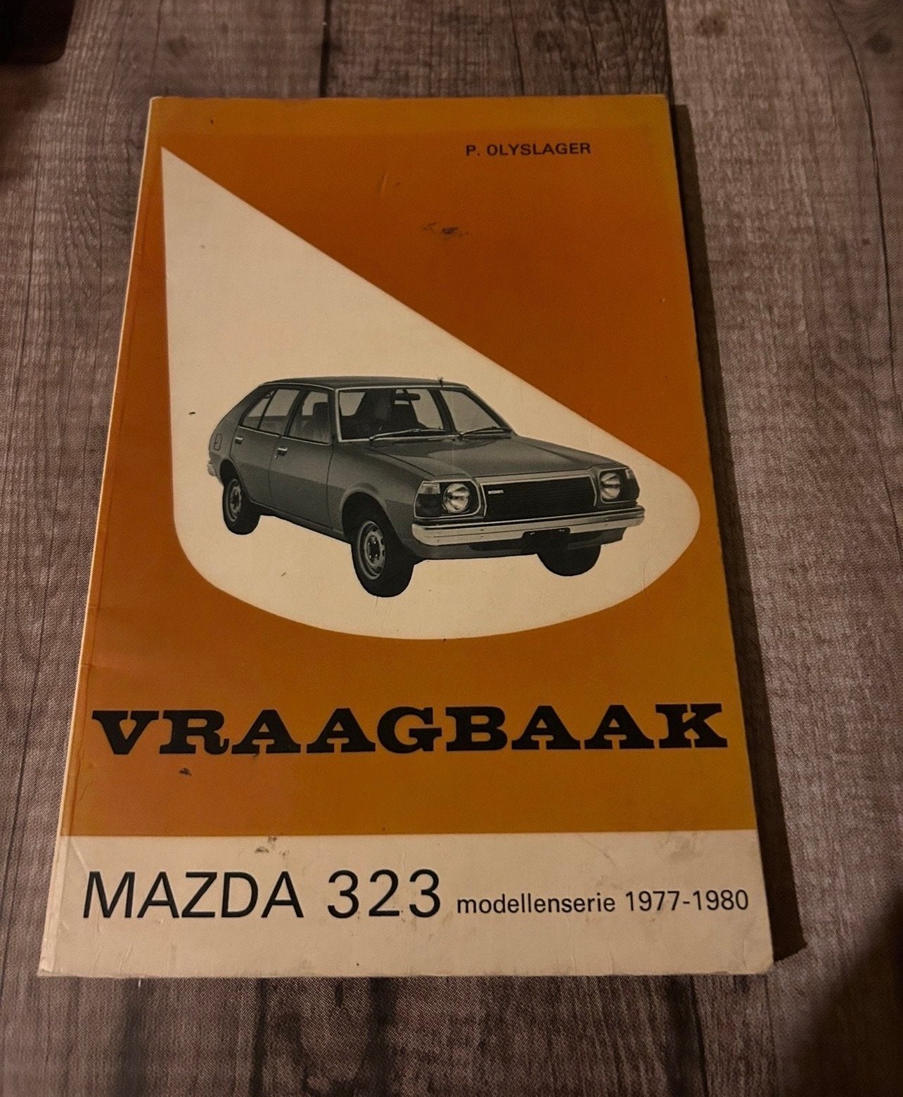 Vraagbaak Mazda 323 modellenserie 1977-1980, Ophalen of Verzenden