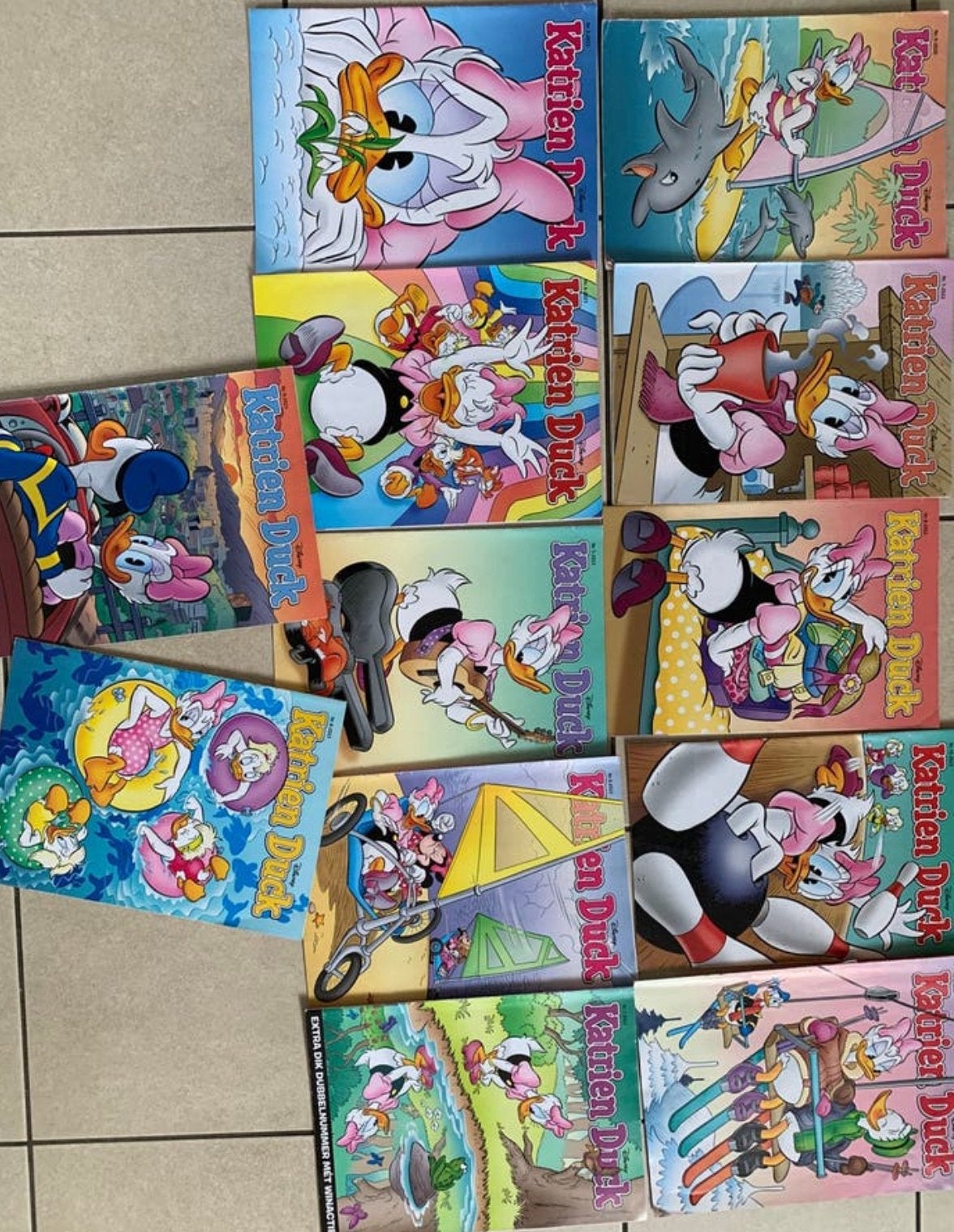 12 stuks Katrien Duck, Boeken, Strips | Comics, Meerdere comics, Ophalen of Verzenden, Zo goed als nieuw, Europa