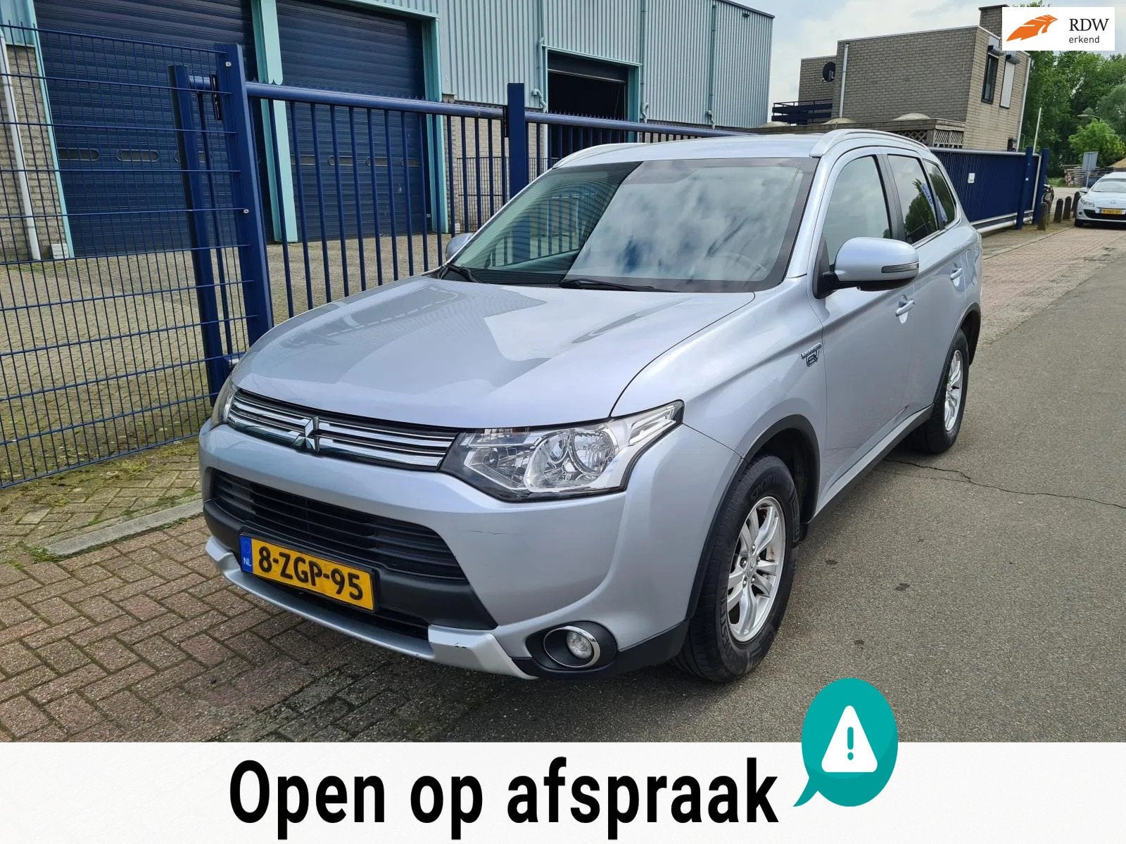 Mitsubishi Outlander 2.0 PHEV AWD Hybride AUT.*ACTIEPRIJS!, Auto's, Zwart, 4 cilinders, Blauw, Leder en Stof