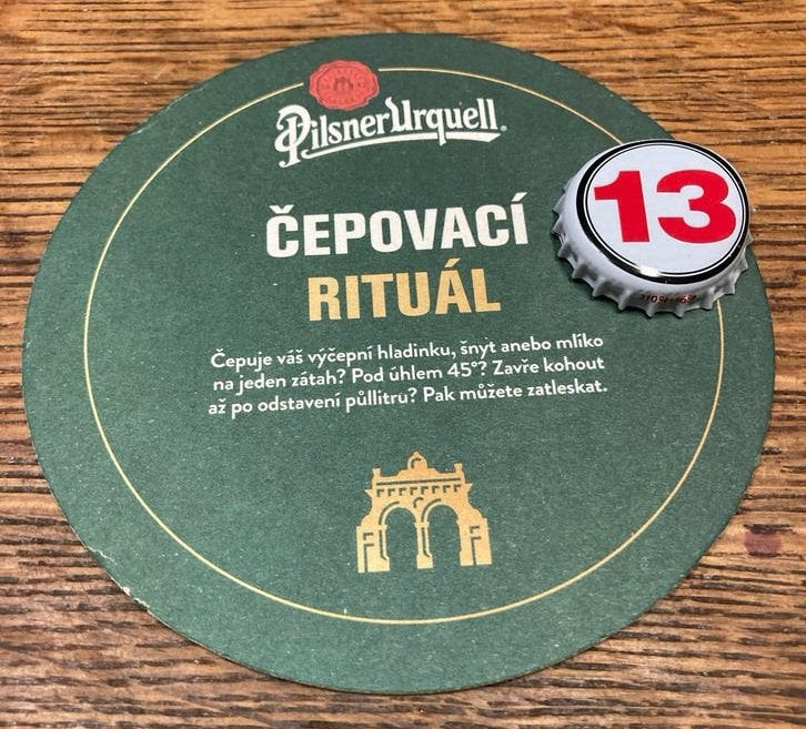 Pilsner Urquell bierviltje en kroonkurk - Tsjechisch, Ophalen of Verzenden, Zo goed als nieuw, Gebruiksvoorwerp