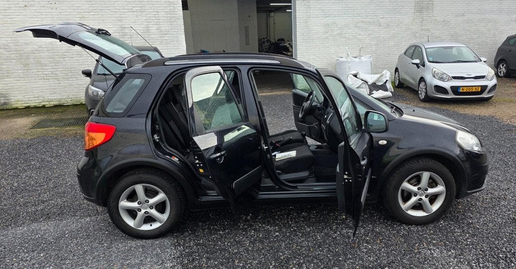 Suzuki SX4 1.6 Comfort 4x4 hoge instap, Gebruikt, Zwart, 4 cilinders, Handgeschakeld