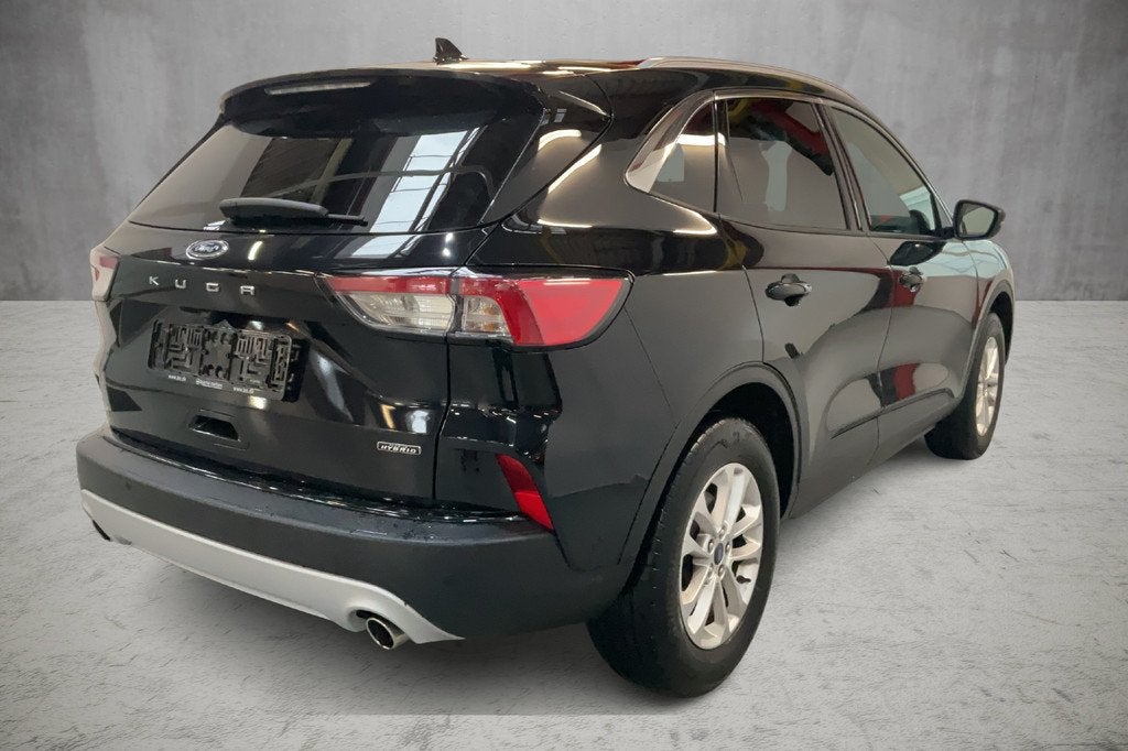 Ford Kuga 2.5 225 pk Titanium X PHEV Plug-in Hybrid Winter P, Auto's, Ford, Gebruikt, Zwart, 4 cilinders, Leder en Stof