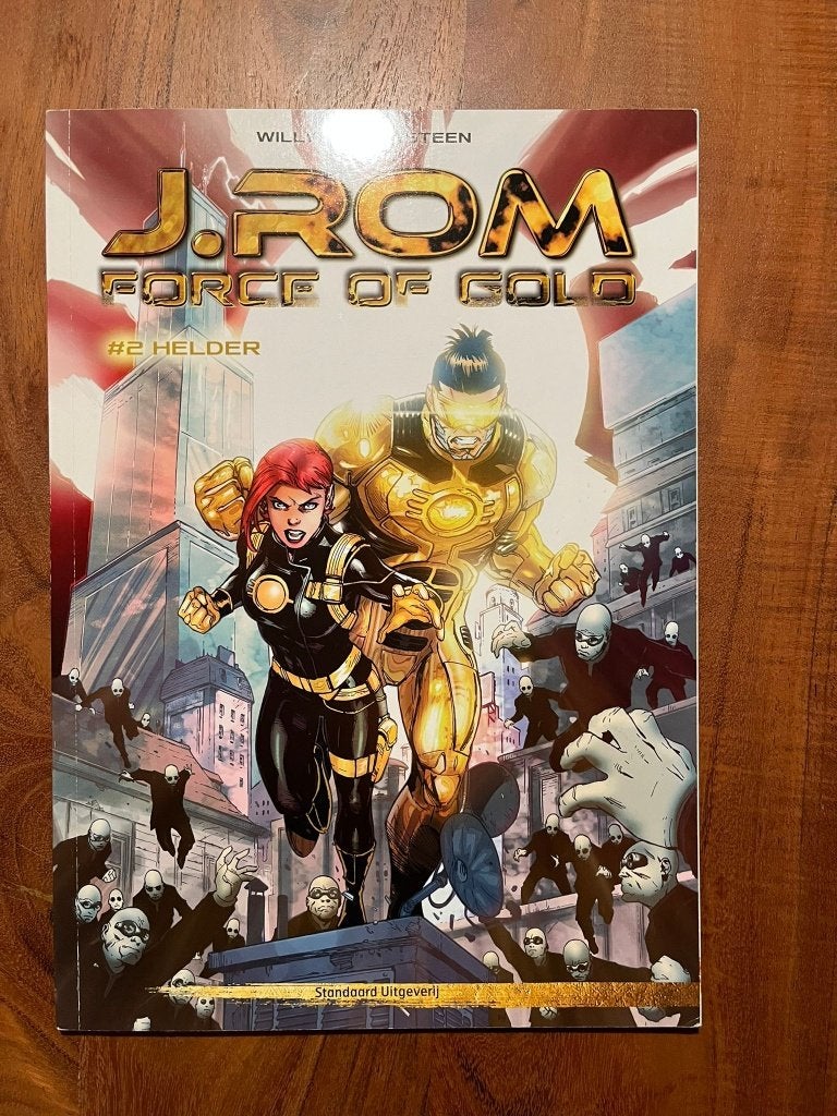 J.Rom  Force Of Gold – Helder, Boeken, Eén stripboek, Ophalen of Verzenden, Zo goed als nieuw