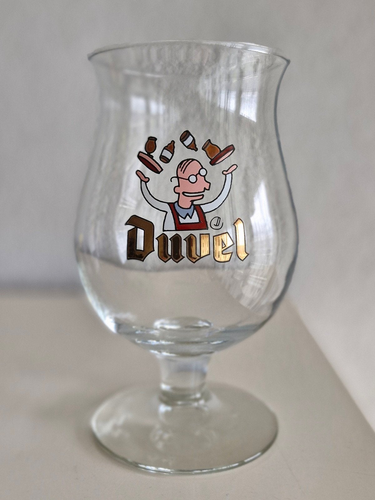 Duvel Glas Jonglerende Ober, Ophalen of Verzenden, Zo goed als nieuw, Glas of Glazen, Duvel