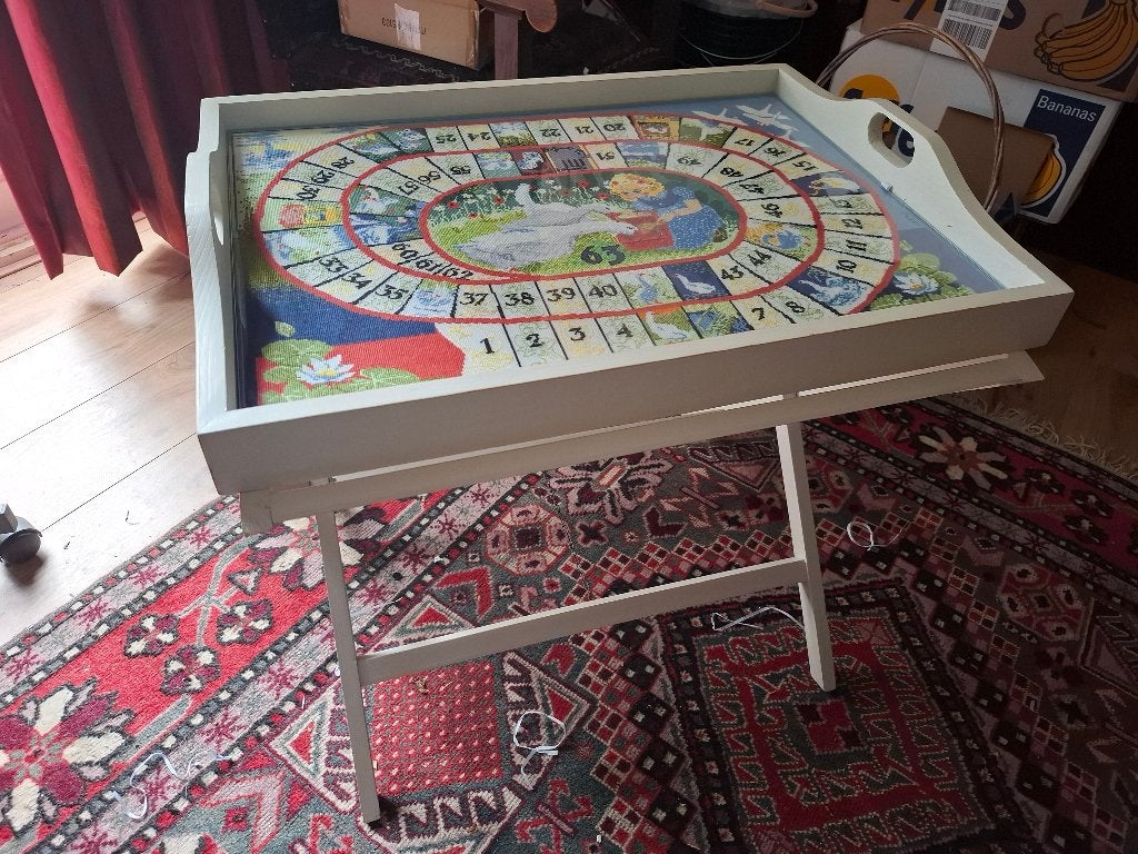 Geborduurd Ganzenbordspel, Ophalen