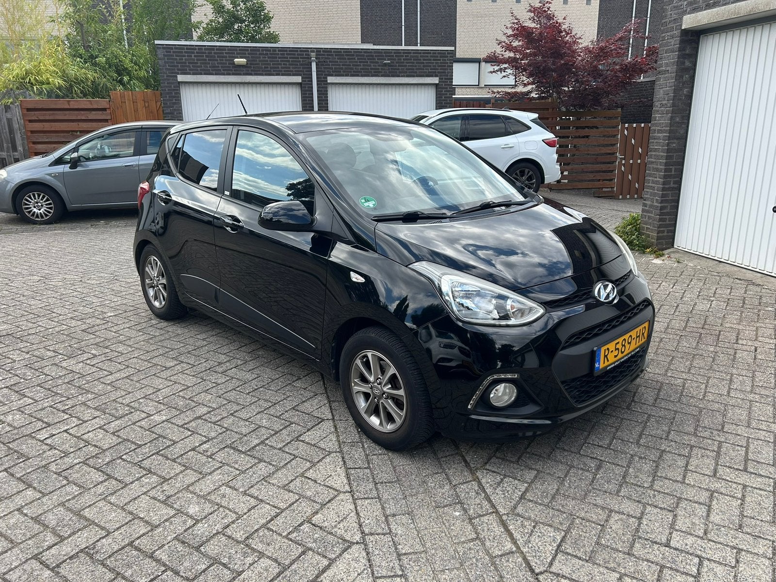 Hyundai i10 1.0i 66pk 2016 Zwart Premium Passion, Stof, Zwart, Handgeschakeld, Particulier