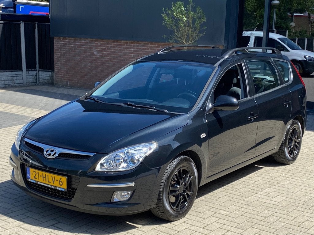 Hyundai I30 CW 1.6i Dynamic NIEUWSTAAT XENON AIRCO ELEKT PAK, Stof, Gebruikt, Zwart, Origineel Nederlands