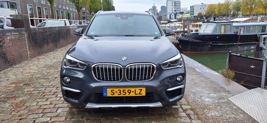 BMW X1 Sdrive18i 136pk Aut 2018 Grijs, Auto's, 136 pk, Zwart, Overige kleuren, Leder en Stof