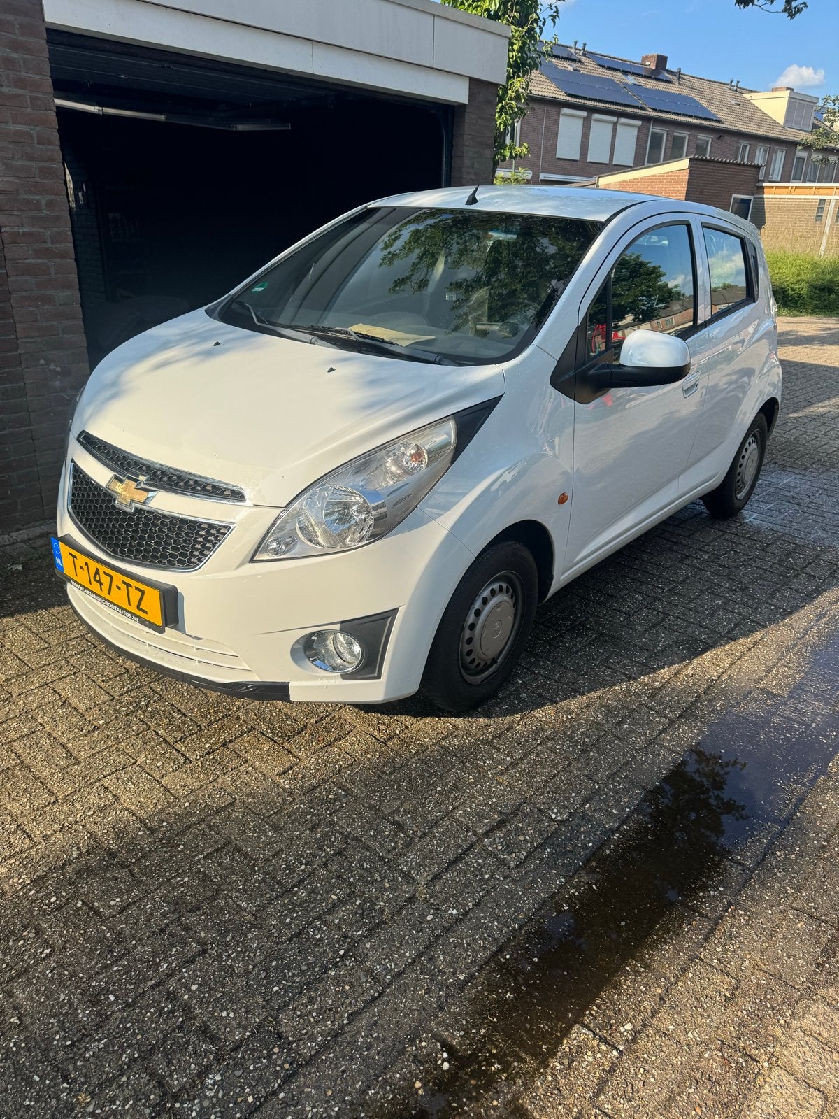 Chevrolet Spark 1.0 Bifuel 2011 Wit, Voorwielaandrijving, Stof, 37 €/maand, Zwart