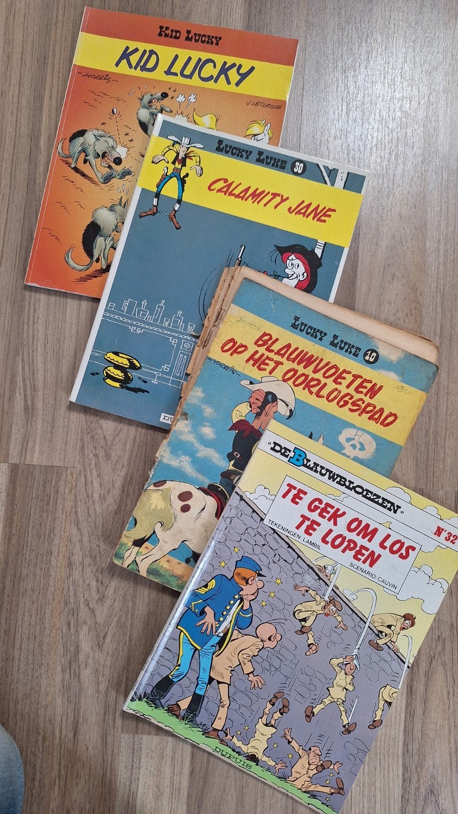 Stripboeken: Lucky Luke, Kid Lucky, De Blauwbloezen, Ophalen of Verzenden