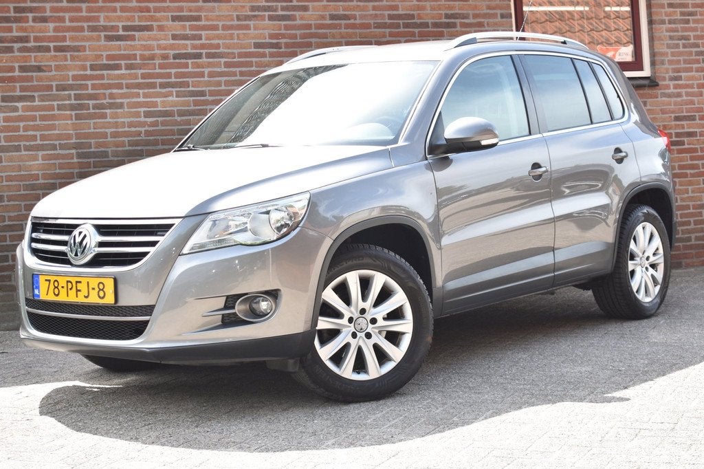Volkswagen Tiguan 1.4 TSI Sport&Style '11 Clima Cruise Inrui, Voorwielaandrijving, Euro 5, Gebruikt, Zwart