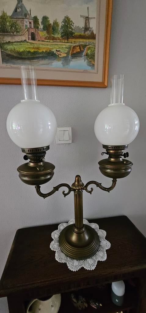 Dubbele olielamp, Ophalen