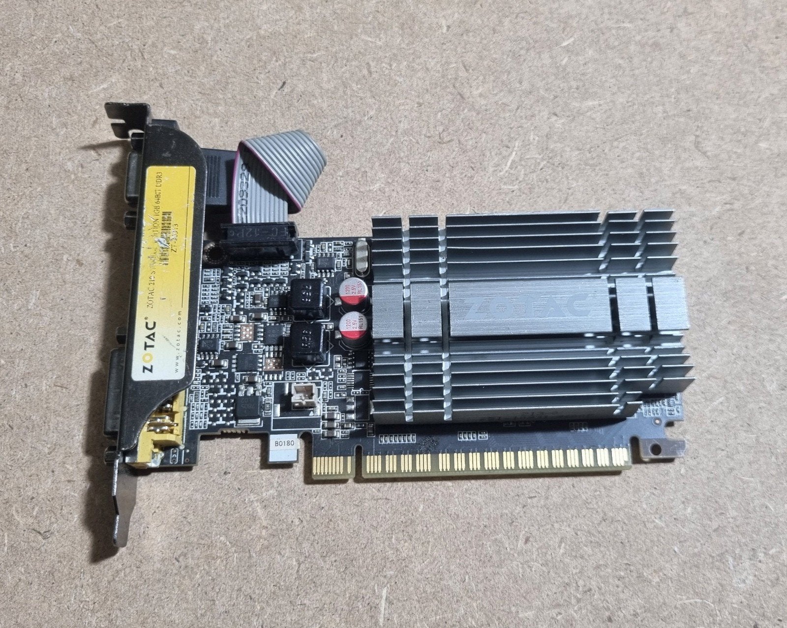 Zotac synergy edition 1GB 64bit DDR3, Computers en Software, Videokaarten, Ophalen of Verzenden, Gebruikt