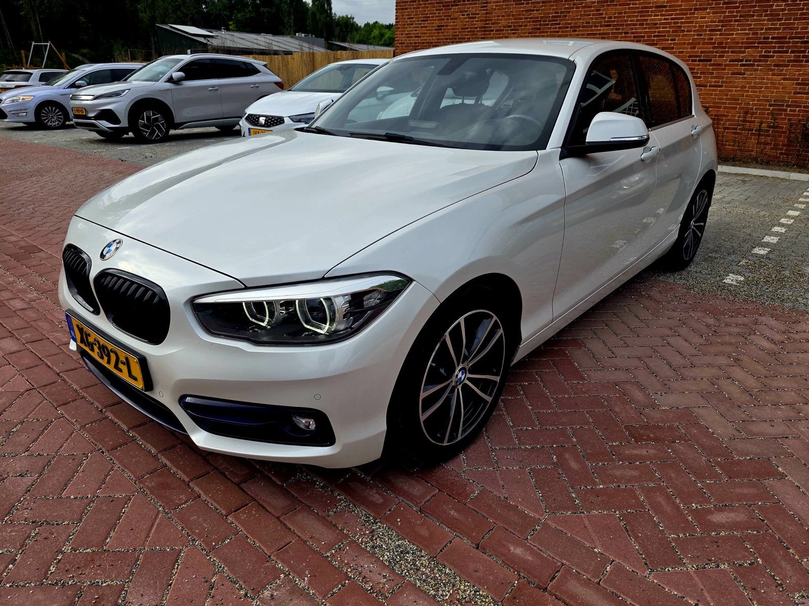 BMW 1-Serie 118i 136pk Aut 2019 Wit, 1295 kg, Wit, Origineel Nederlands, 650 kg