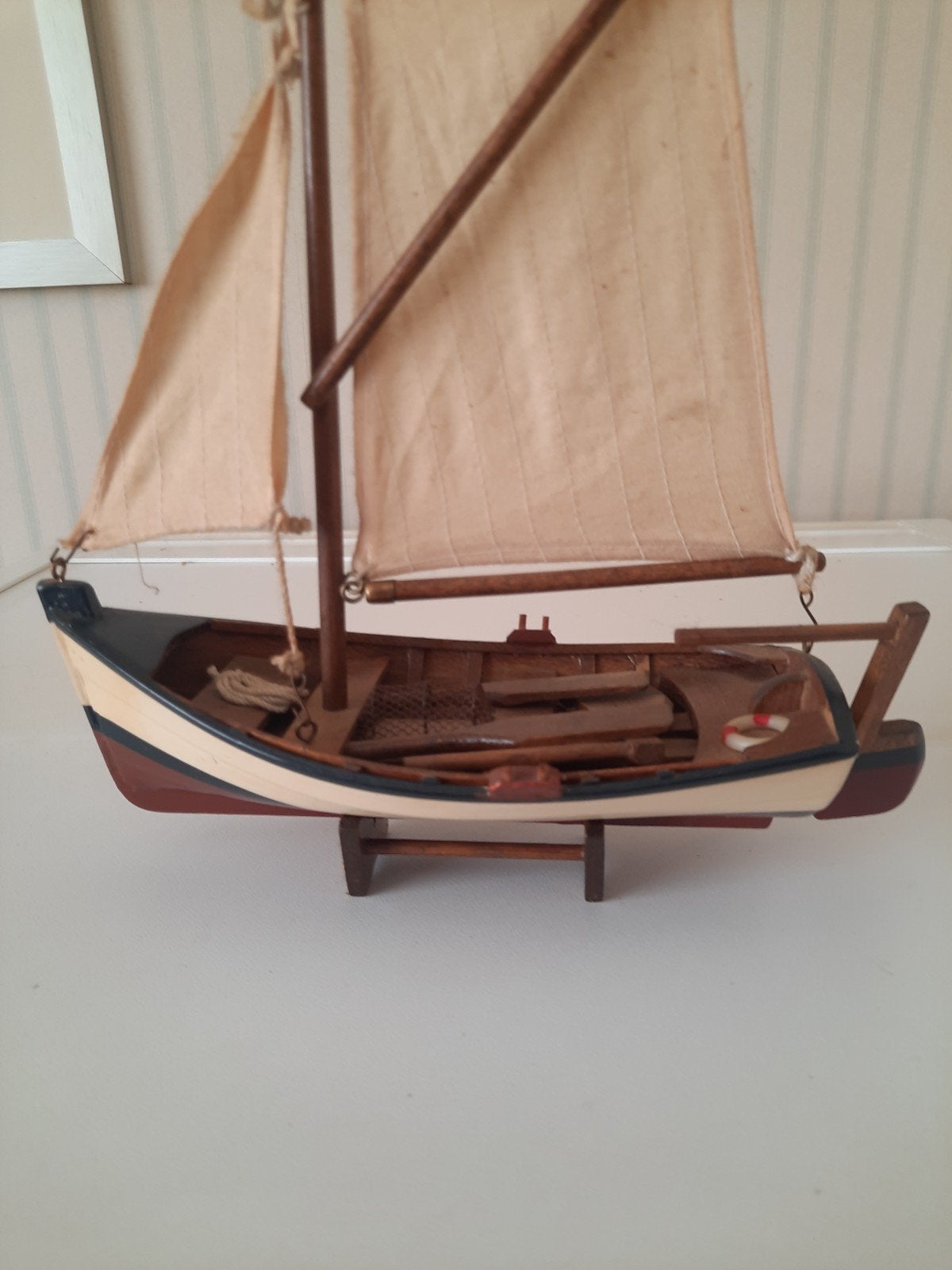 model zeilboot, Ophalen
