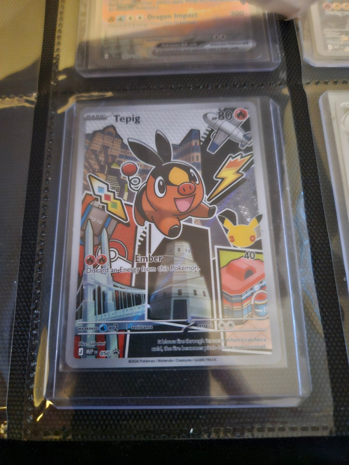 Pokemon Tepig MEP 050, Ophalen of Verzenden, Zo goed als nieuw, Losse kaart, Foil