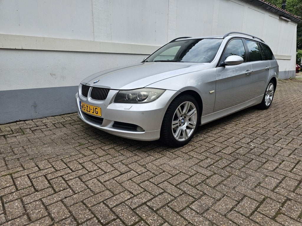 BMW 3 Serie Touring 318i Business Line (bj 2008, automaat), Auto's, BMW, Automaat, 1435 kg, Parkeersensor, Origineel Nederlands