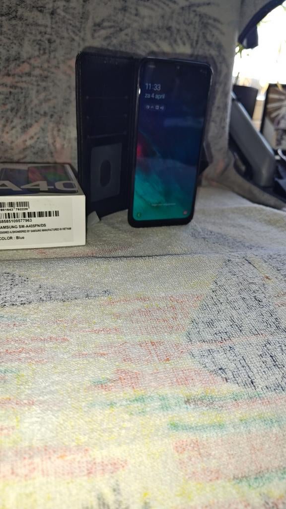 Samsung Galaxy A40 met oplader en hoesje, Telecommunicatie, Mobiele telefoons | Samsung, Zwart, Touchscreen, Ophalen of Verzenden