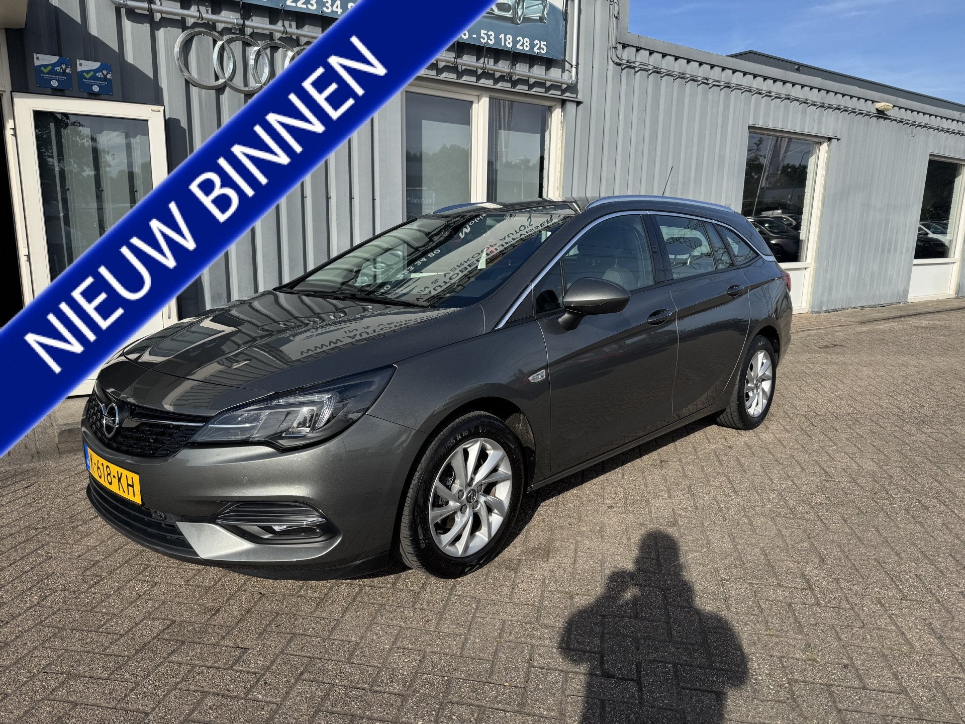 Opel Astra Sports Tourer 1.2 Business Elegance (bj 2021), Auto's, Voorwielaandrijving, 1199 cc, Leder en Stof, Origineel Nederlands
