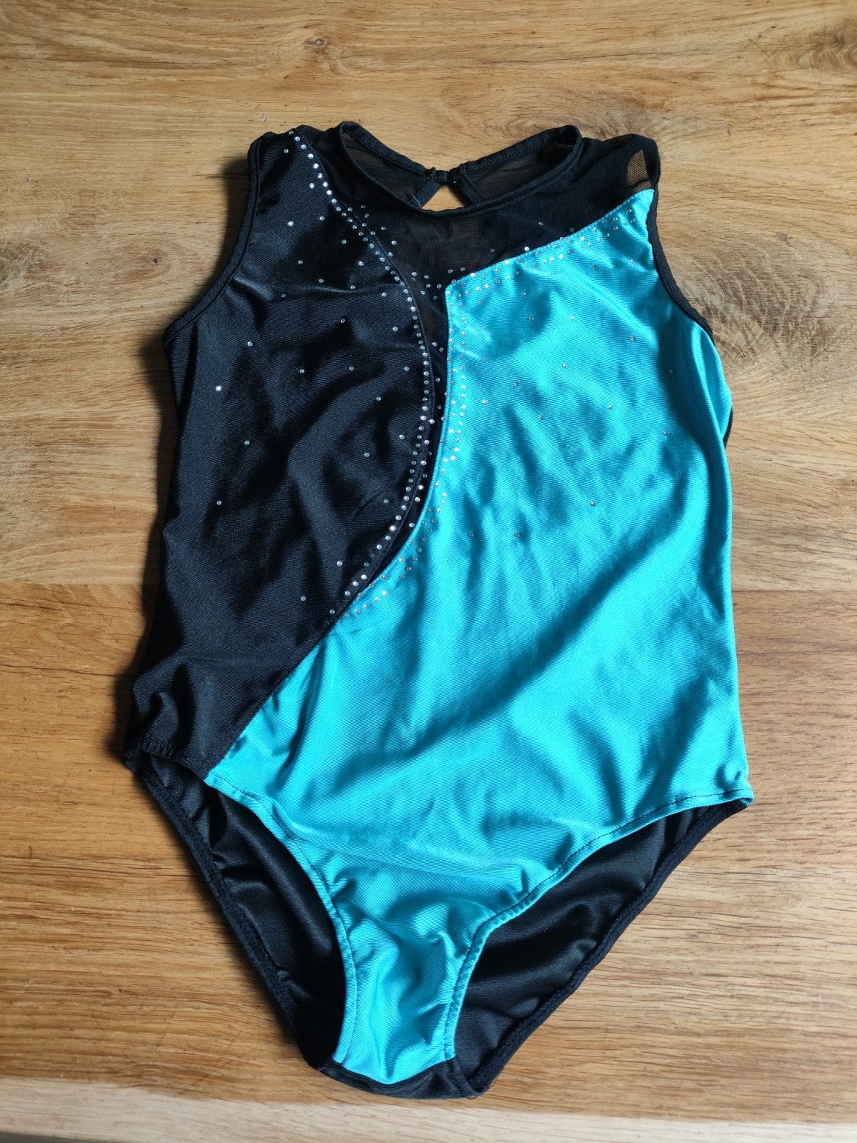 Turnpakje zwart/blauw met glitters, Ophalen of Verzenden