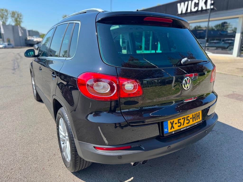 Volkswagen Tiguan 1.4 TSI Trend&Fun 4Motion Leder Panorama C, Auto's, Gebruikt, Zwart, 4 cilinders, Zwart