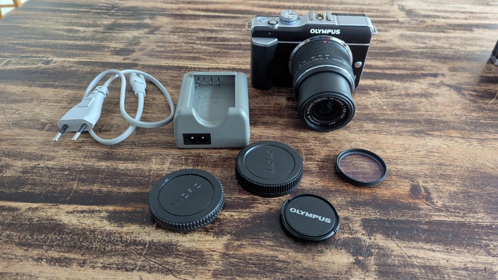 Olympus E-pl1 met M. Zuiko Digital 14-42mm II R MSC, Ingebouwde flitser, 12 megapixels, Ophalen of Verzenden, Zo goed als nieuw