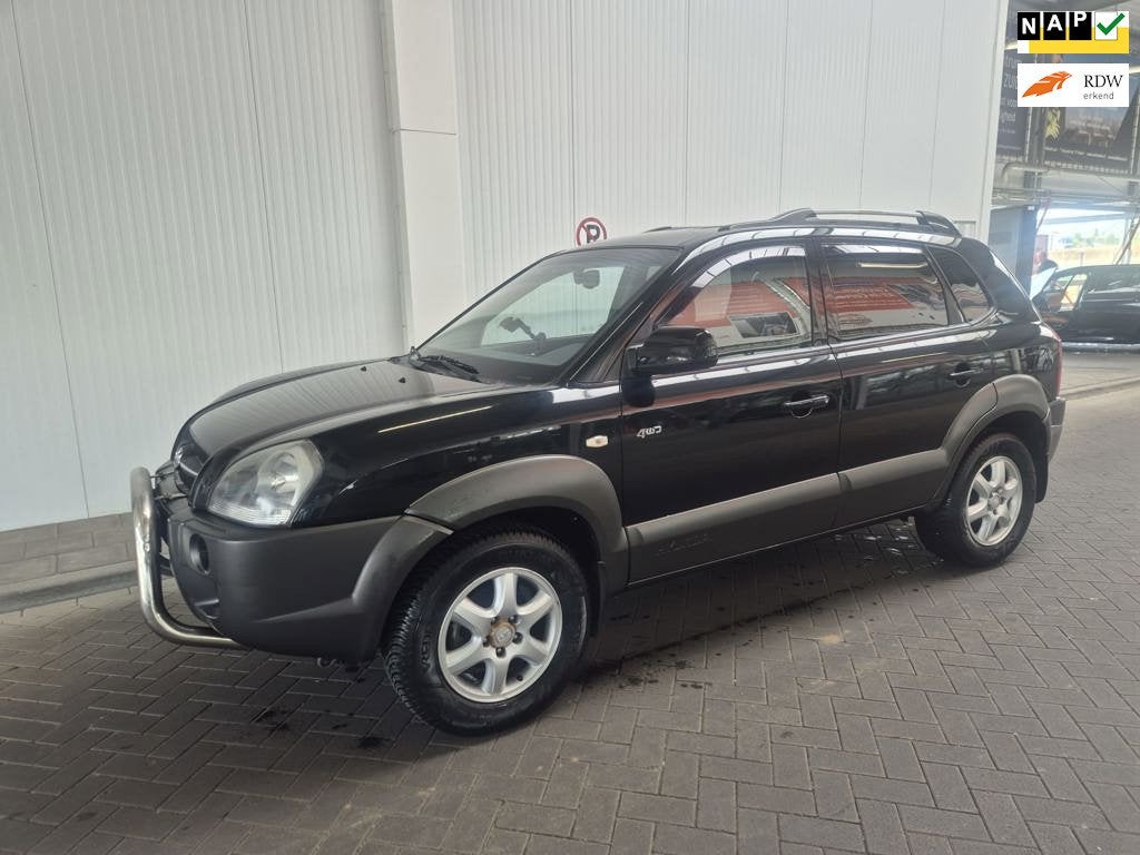 Hyundai Tucson 2.7i V6 4x4 Automaat, Auto's, Automaat, Gebruikt, Lederen bekleding, 2656 cc