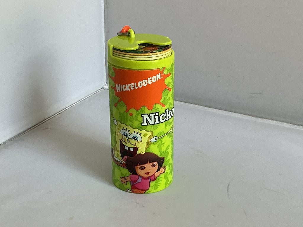 Nickolodeon # Koker vol met metalen schijfjes, Ophalen of Verzenden, Zo goed als nieuw, Jongen of Meisje